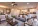 Spacious living room with gray sofa and wooden coffee table at 621 Seldon Dr, Charlotte, NC 28216