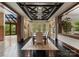 Elegant dining room with recessed lighting, decorative ceiling, and outdoor views at 10310 Wildlife Rd, Charlotte, NC 28278