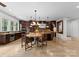 Spacious kitchen with stainless appliances, custom cabinets, and an island with bar seating at 10310 Wildlife Rd, Charlotte, NC 28278