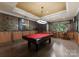 Entertainment room featuring a billiards table, recessed lighting and stylish seating for leisure and socializing at 10310 Wildlife Rd, Charlotte, NC 28278