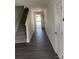 Entryway with gray flooring, stairs and white trim at 1313 Dodd St, Shelby, NC 28152