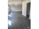 Sunlit living room featuring gray vinyl flooring and recessed lighting at 1313 Dodd St, Shelby, NC 28152