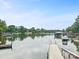 Serene lake view with private docks and boats at 12009 Matthew Martin Ln, Charlotte, NC 28216