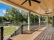 Large deck with lake views and stairs leading to yard at 8566 Birchwood Ln, Terrell, NC 28682