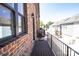 Outdoor balcony features brick exterior and neighborhood view at 222 Gilead Rd, Huntersville, NC 28078