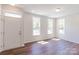 Bright and airy entryway featuring multiple large windows and natural light at 226 Gilead Rd, Huntersville, NC 28078