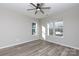 Bright bedroom with wood-look flooring and large windows at 2707 Crescent Ln, Gastonia, NC 28052