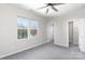 Bedroom with ceiling fan and walk-in closet at 2707 Crescent Ln, Gastonia, NC 28052