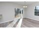 Bright dining area with hardwood floors and sliding glass doors to backyard at 2707 Crescent Ln, Gastonia, NC 28052