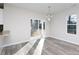 Bright dining area with hardwood floors and sliding glass doors to backyard at 2707 Crescent Ln, Gastonia, NC 28052