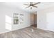 Spacious living room with hardwood floors and neutral color palette at 2707 Crescent Ln, Gastonia, NC 28052