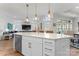 Large kitchen island with seating and a sink at 1353 Millview Ln, Matthews, NC 28104