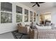 Relaxing screened porch with wicker furniture and ceiling fan at 4028 Brandywine Ter, Lancaster, SC 29720