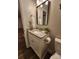 Modern bathroom with a single vanity, granite countertop, and new fixture at 513 Mary Charlotte Dr, Charlotte, NC 28262