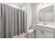 Simple bathroom with shower/tub combo and white vanity at 9714 Ainslie Downs St, Charlotte, NC 28273