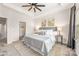 Spacious primary bedroom with a large bed, ample closet space, and neutral decor at 9714 Ainslie Downs St, Charlotte, NC 28273