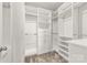 Large walk-in closet with ample shelving and hanging space at 9714 Ainslie Downs St, Charlotte, NC 28273