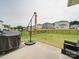 Patio with umbrella, grill, and view of backyard at 102 Guardian Gate Dr, Mooresville, NC 28115