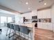 Modern kitchen with white cabinets and granite countertops at 102 Guardian Gate Dr, Mooresville, NC 28115