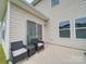 Small patio with two chairs and side table at 102 Guardian Gate Dr, Mooresville, NC 28115