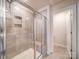 Large walk-in shower with built-in seat at 102 Guardian Gate Dr, Mooresville, NC 28115