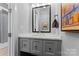 Sophisticated bathroom with gray vanity and marble countertop at 3645 Pelham Ln, Charlotte, NC 28211