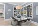 Elegant dining room with large windows overlooking the pool and backyard at 3645 Pelham Ln, Charlotte, NC 28211