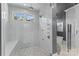 Large walk-in shower with multiple shower heads and built-in seat at 3645 Pelham Ln, Charlotte, NC 28211