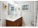 Bathroom with double sink vanity, ample lighting, and neutral paint for a modern feel at 317 Annafrel St, Rock Hill, SC 29730