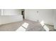 Spacious bedroom with gray carpet and natural light at 12320 Riceland Way, Midland, NC 28107