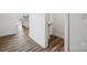 Clean, modern powder room with pedestal sink and wood-look floors at 731 Olde England Dr, Lincolnton, NC 28092