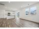 Open concept kitchen with white cabinets and island at 731 Olde England Dr, Lincolnton, NC 28092