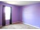 Bright bedroom with purple walls and carpet at 1109 Creedmore Ct, Charlotte, NC 28215