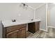 Bathroom vanity featuring dual sinks, dark wood cabinetry, and bright lighting at 1725 Feature Rd, Lancaster, SC 29720