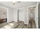 Bedroom featuring a closet and sink area with modern flooring at 1725 Feature Rd, Lancaster, SC 29720