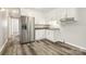 A well-lit kitchen equipped with stainless steel appliances and ample cabinet storage at 1725 Feature Rd, Lancaster, SC 29720