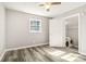 A bright room has laundry equipment visible through an open door at 1725 Feature Rd, Lancaster, SC 29720