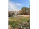 Yard featuring a road and many trees at 1725 Feature Rd, Lancaster, SC 29720