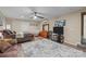 Spacious bedroom featuring a ceiling fan, a dresser and a flat screen tv at 9301 Poinchester Dr, Mint Hill, NC 28227