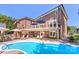 Backyard with a patio, swimming pool, umbrellas and lounge chairs at 5300 Green Rea Rd, Charlotte, NC 28226