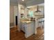 Well-appointed kitchen with white cabinets, stainless steel appliances, hardwood floors, and a functional layout at 5300 Green Rea Rd, Charlotte, NC 28226