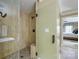 Beautifully tiled shower with glass door and walls and neutral, elegant design at 5300 Green Rea Rd, Charlotte, NC 28226