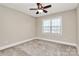 Bright bedroom featuring a ceiling fan and large window with blinds at 625 Highland Ridge Pt, Clover, SC 29710