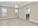 Bright and airy bedroom with plush carpeting and an ensuite bathroom at 625 Highland Ridge Pt, Clover, SC 29710