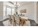 Charming dining room with bay window and stylish table setting at 625 Highland Ridge Pt, Clover, SC 29710