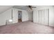 Upstairs bedroom with a ceiling fan and carpet at 112 S 2Nd Ave, Maiden, NC 28650