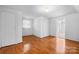 Bedroom featuring wood floors and natural light at 112 S 2Nd Ave, Maiden, NC 28650