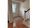 Welcoming entryway featuring natural light, a window and stairwell at 112 S 2Nd Ave, Maiden, NC 28650