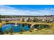 Aerial view of beautiful community with a pond and water feature on a sunny day at 8121 Festival Way, Charlotte, NC 28215