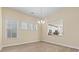 Inviting dining area features three large windows that offer plenty of natural light at 8121 Festival Way, Charlotte, NC 28215